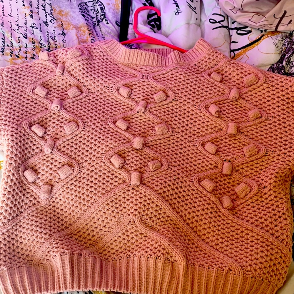 Size kids 14. It iswoven heart. Pink never been worn.